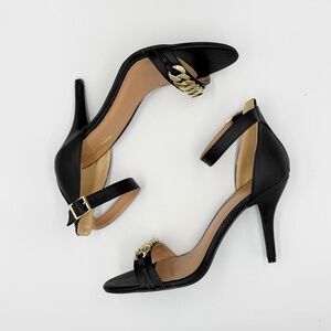Glaze Black Heels with Gold Chain Accent